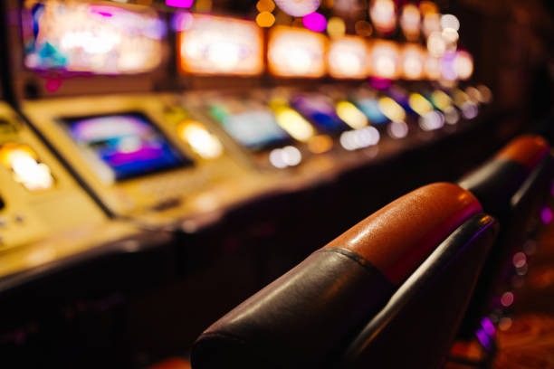 Wolf Gold slot game interface on liga5000 login showing five reels and paylines
